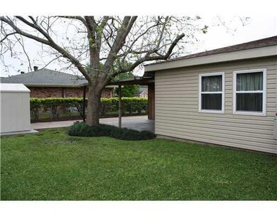 Exterior Back. Mature Pecan tree!