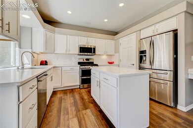 7647 Desert Wind Dr, Colorado Springs, CO 80923 - photo 7