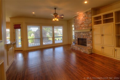Living room with big windows to the back yard, fir