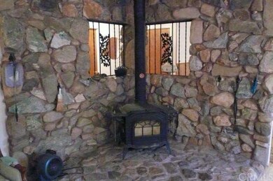 Wood burning stove / Opening for heat to enter roo