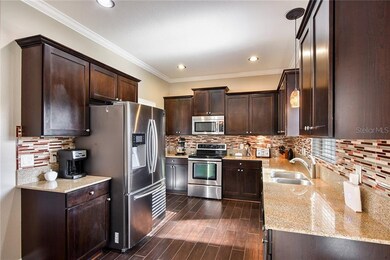 Kitchen view -1:  Espresso Cabinets, Nickel Pulls,