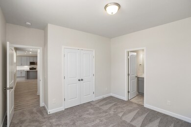 First floor En Suite. Similar home, same plan. Colors and selections may vary.