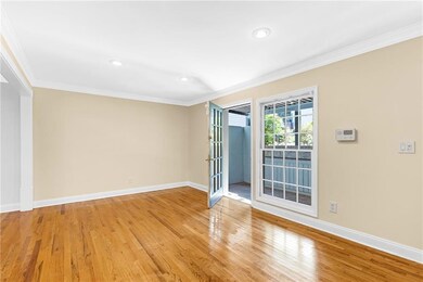 Unfurnished room featuring crown molding, light wood-type flooring, and recessed lighting