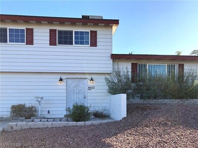 Beautiful desert landscaping with driveway and eas