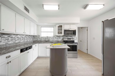 Large Kitchen with Moveable Island.