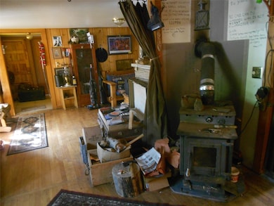 Woodstove between living room and kitchen