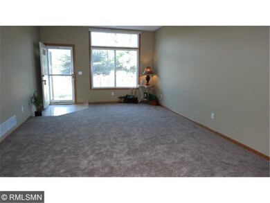Wait till you see how roomy this like new home is.