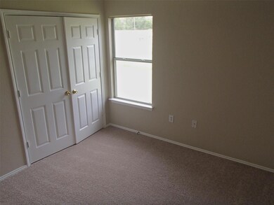 Unfurnished bedroom with carpet floors, multiple 