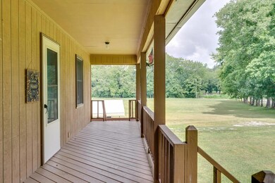 Enjoy your morning coffee or tea on some rocking chairs on the covered front porch!