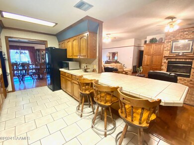 kitchen open to living area & dining