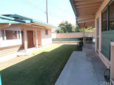 Large storage shed in backyard - unpermitted - not