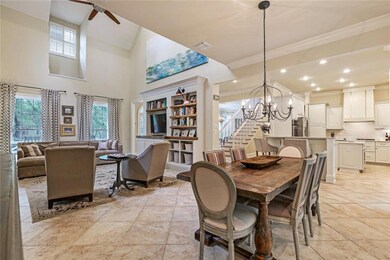  View of den, dining area and kitchen and it's ope