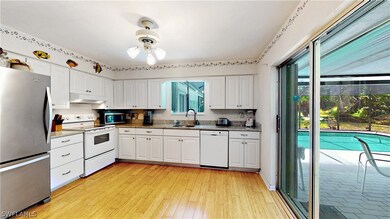 Spacious Kitchen - Granite Counters - Slider to La