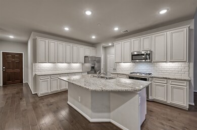 42 inch cabinets, huge island and offer plenty of