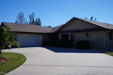 112 Kamal Pkwy, Triple Lot with Gulf access 3/2, Big Pool, Dock, Prime Location at walking distance of Publix, Sears, Target, Santa Barbara Pkwy, Veterans Pkwy and multiple restaurants.