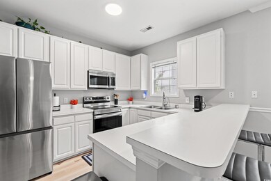 Kitchen featuring light hardwood / wood-style floo