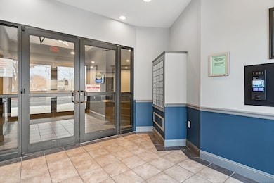 Spicket Commons unit 412, Methuen, MA 01844 - photo 4