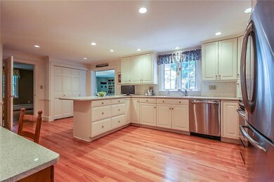 Kitchen leads to dining, formal...