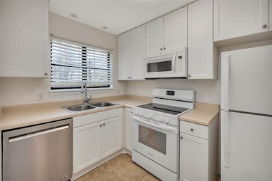 Kitchen with updated cabinets and new range