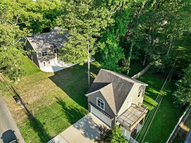 Aerial view of guesthouse and main house.