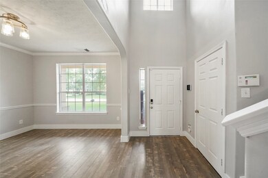Two-story entry way in this lovely home!  The door