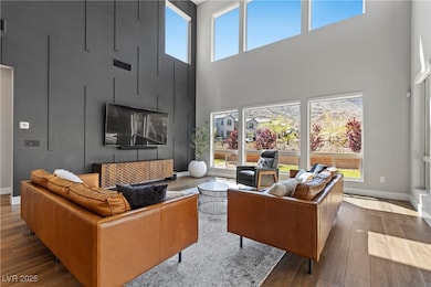 Soaring ceiling with custom wall paneling!