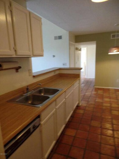 Kitchen with Hallway to Bedrooms ahead