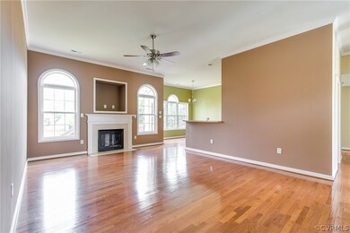 The living room is open to the kitchen and both in