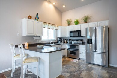 Open Kitchen with Stainless Appliances