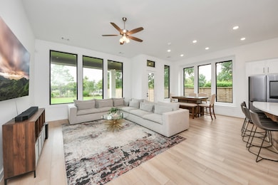 This bright, open-concept living space features la