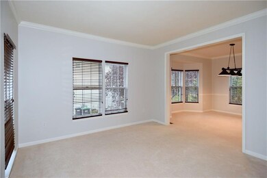 Another view of the spacious living room leading t