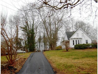 Exterior Front. New Paved Driveway