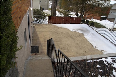 Side patio off lower floor