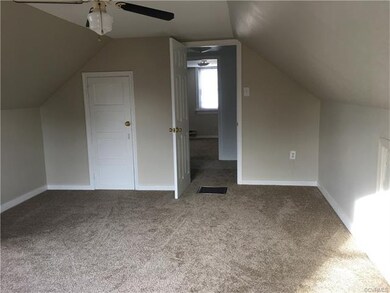 Upstairs Bedroom with Fan and New Carpet