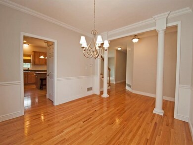 ELEGANT DINING ROOM W/WAINSCOTING, CROWN MOLDING &