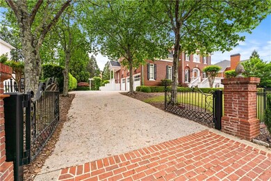 View of gate with a fenced front yard