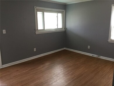 Living Room with New Laminate Floors, Fresh Paint