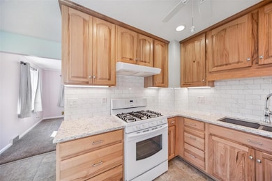 Gas Stove & Tiled Backsplash