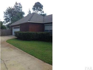 Beautifully manicured shrubs and 2 car oversized garage.