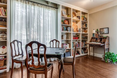 Dining room with dark wood-style floors