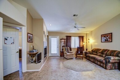 vaulted great room with fireplace