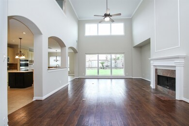 The open and airy view of the living room from the front door.