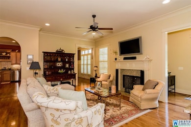 One of three living spaces, this area located right off of the foyer is a versatile space. Hardwood floors and 12 foot ceiling all thru the main level. Gas/woodburning fireplace is focal point of this lovely room. Minutes to the high school and inter