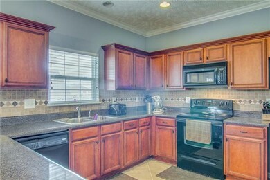 This HUGE kitchen offers lots of cabinet and count