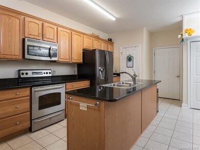Stainless steel appliances and granite counter top