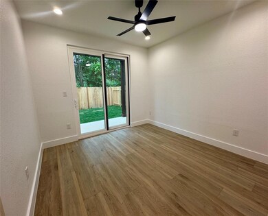 Unfurnished room with baseboards, a ceiling fan, 