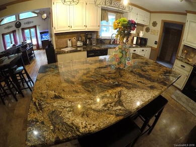 Beautiful granite on all kitchen counter surfaces,