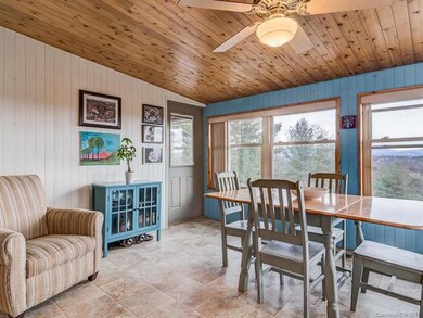 Bright sunroom with long-range views to the South!