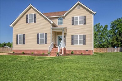 Vinyl siding, aggregate double-width driveway, side-load 2-car garage, fenced rear yard are just a bit of what you can enjoy with this home.