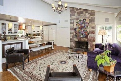 Family Room with Fireplace adjacent to the updated
